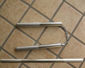 Nunchaku in metallo convertibile a bastone