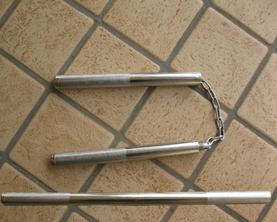 Nunchaku in metallo convertibile a bastone