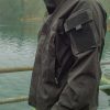 Giacca impermeabile antivento in softshell MFH verde
